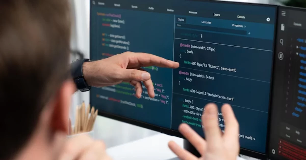 Two men working in AI-software testing