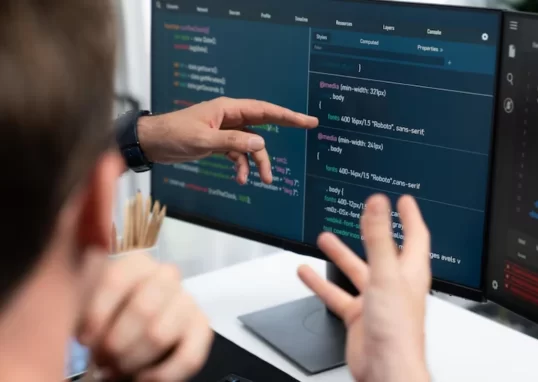 Two men working in AI-software testing
