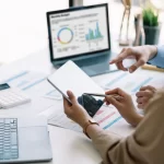 Picture of a woman analyzing quality metrics