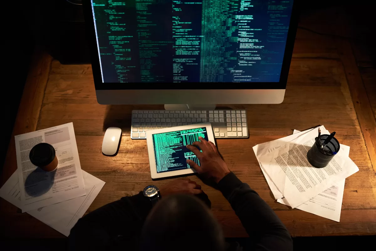 Image of male hands coding