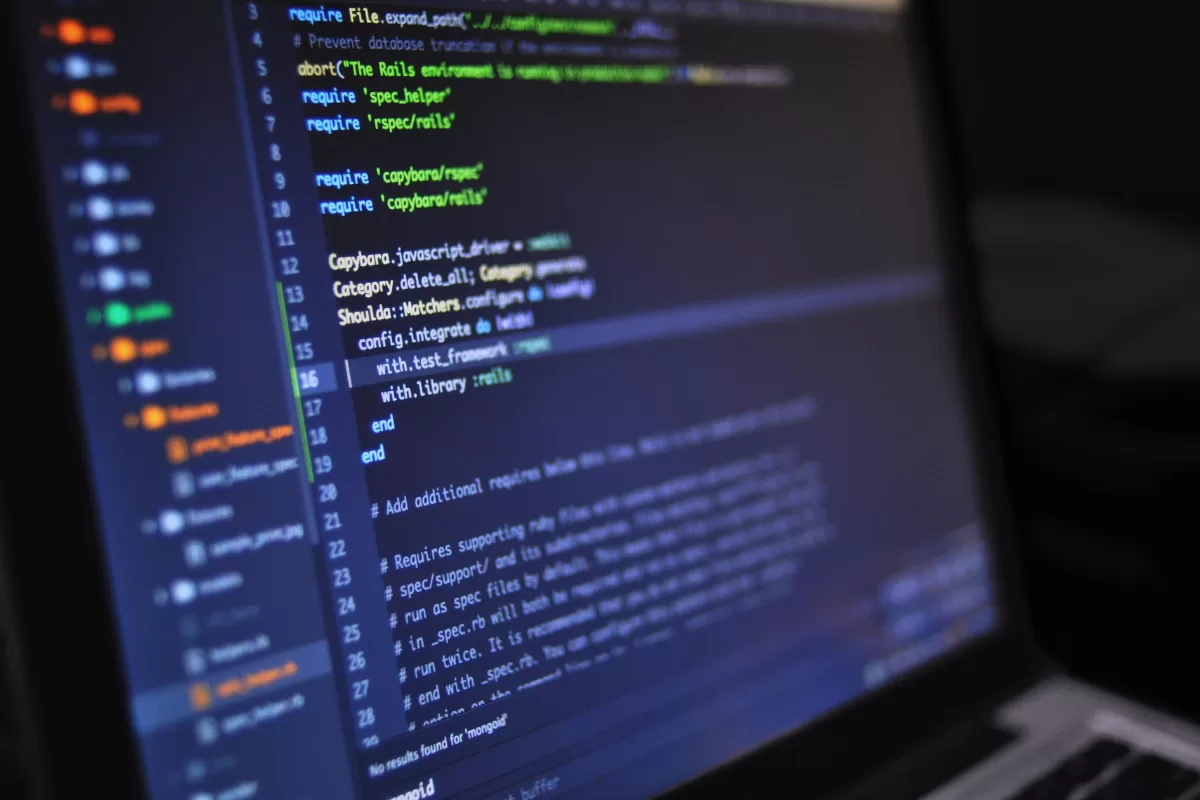 Close-up of a computer screen displaying code, illustrating AI-powered software testing and automation. 