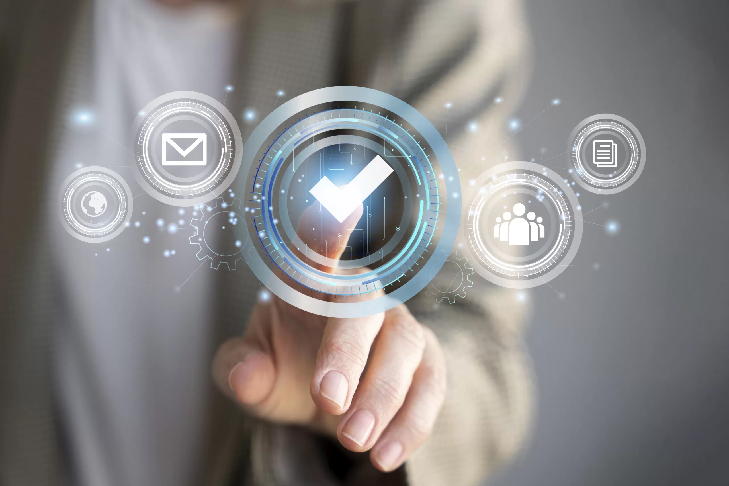 Hand touching digital check icon surrounded by automation and software quality symbols