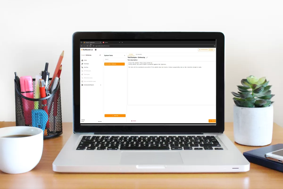 Laptop screen displaying the TestBooster.ai platform, with stationery items, a cup of coffee, and a plant nearby.